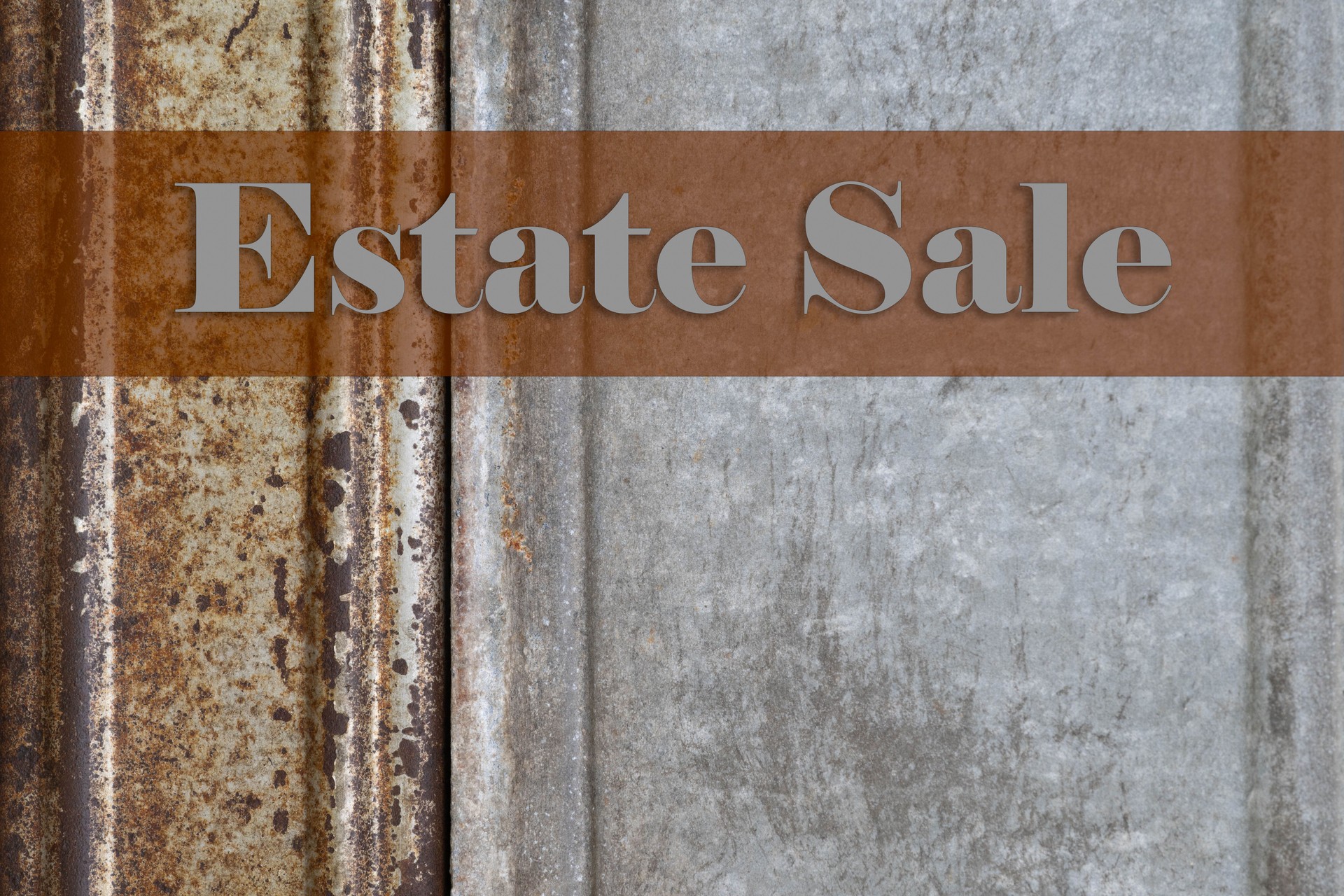 Estate sale text on a rusty metal background with copy space for dates and times